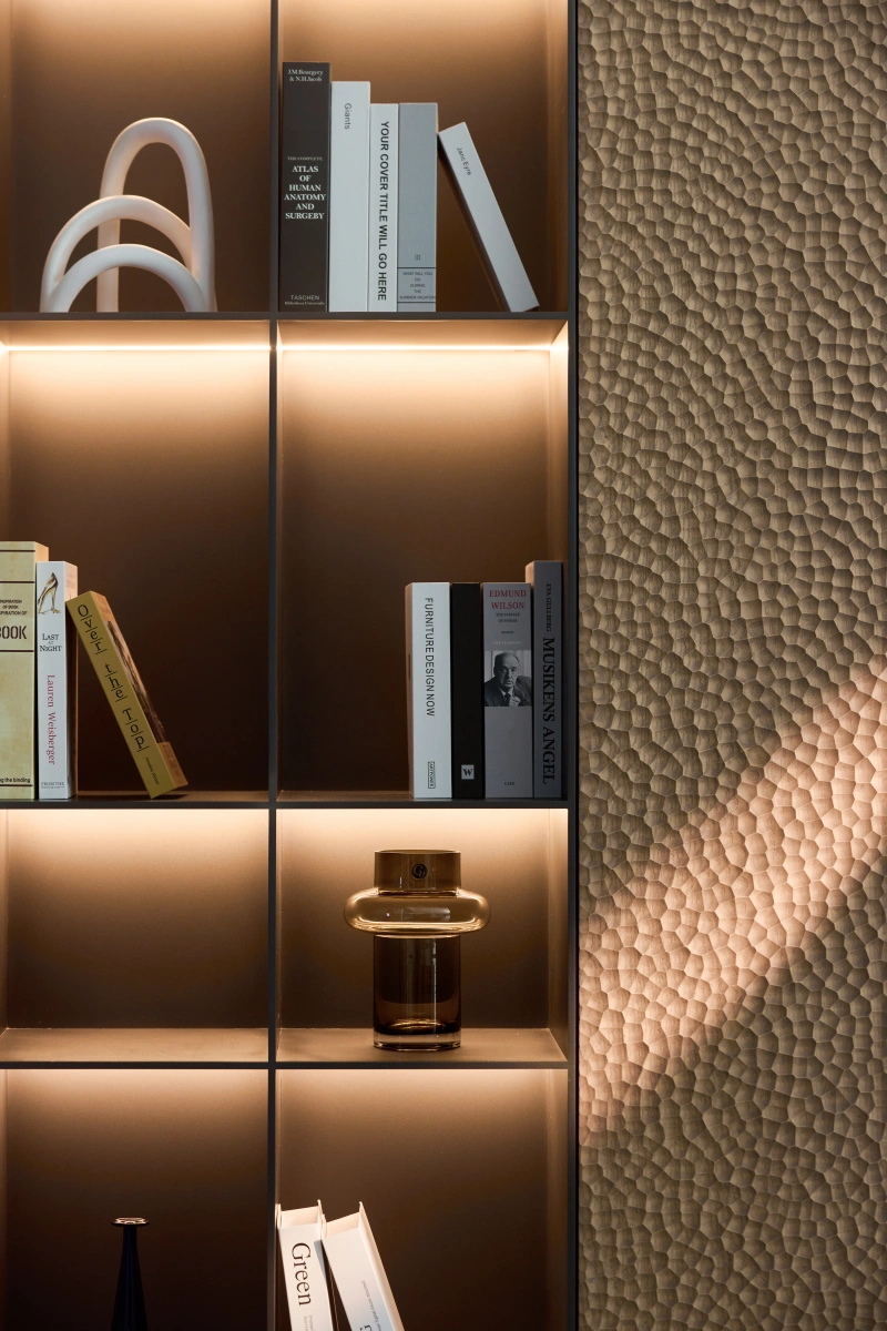 Custom bookshelf and luxury furniture display in Singapore showroom